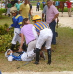 Joe Bravo attended to after being thrown from his mount on Trickita
